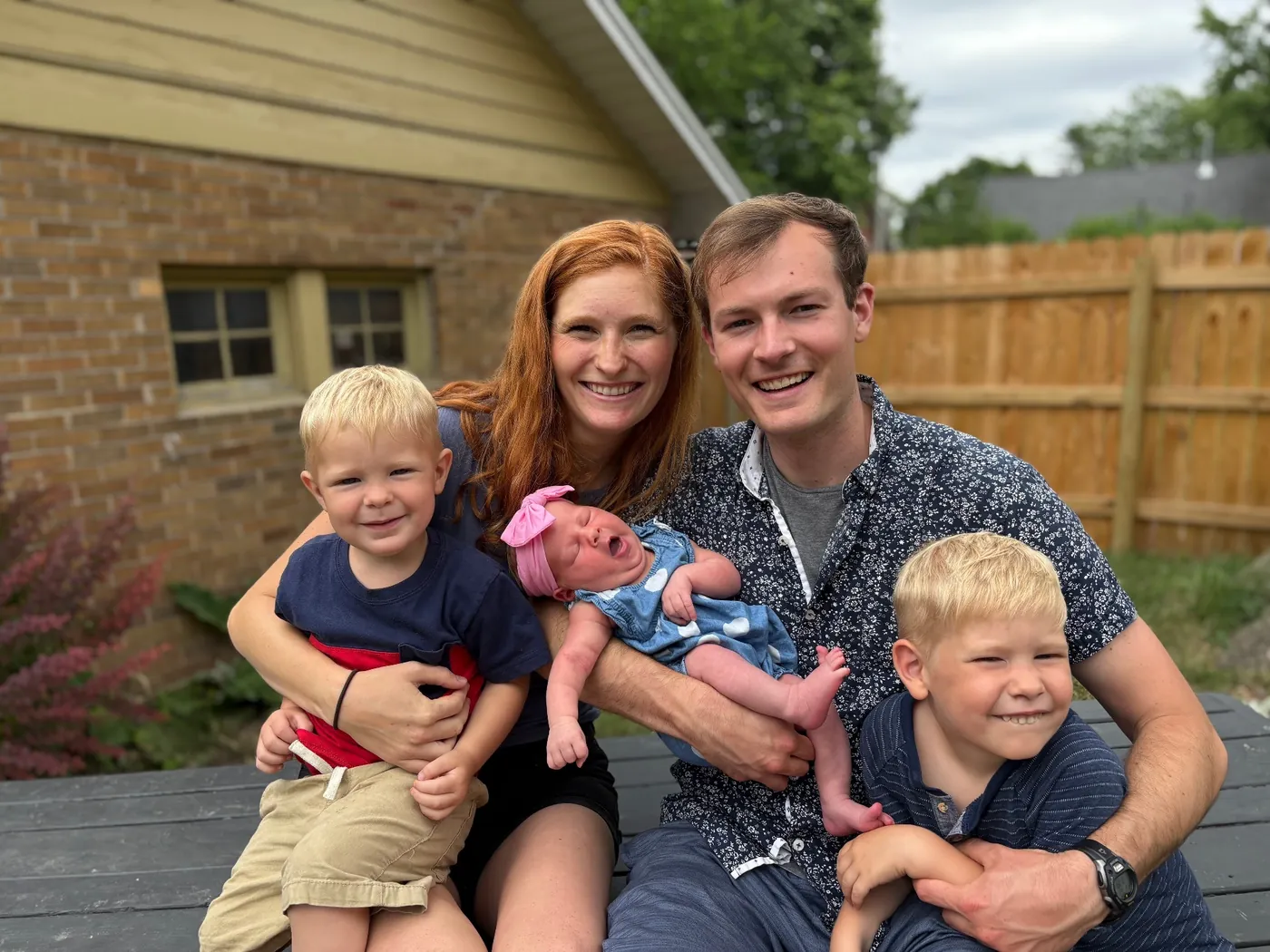 Carson with his wife and three children