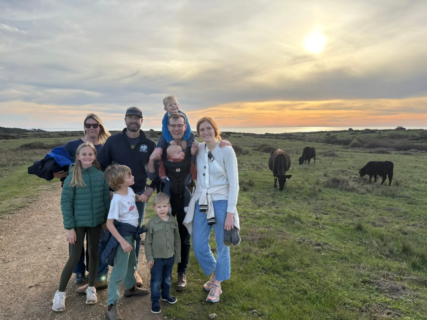 Family and friends at sunset